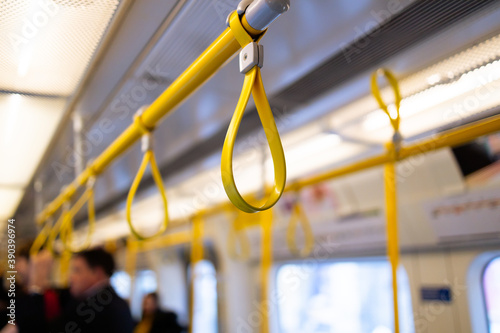 Yellow Hanging Strap in a public transport