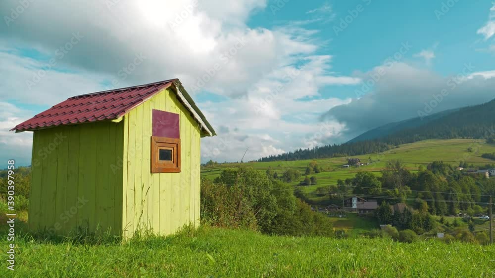 Timelapse Little green house in the mountains for watching the herd of cows or sheeps Timelapse Little green house in the mountains for watching the herd of cows or sheeps