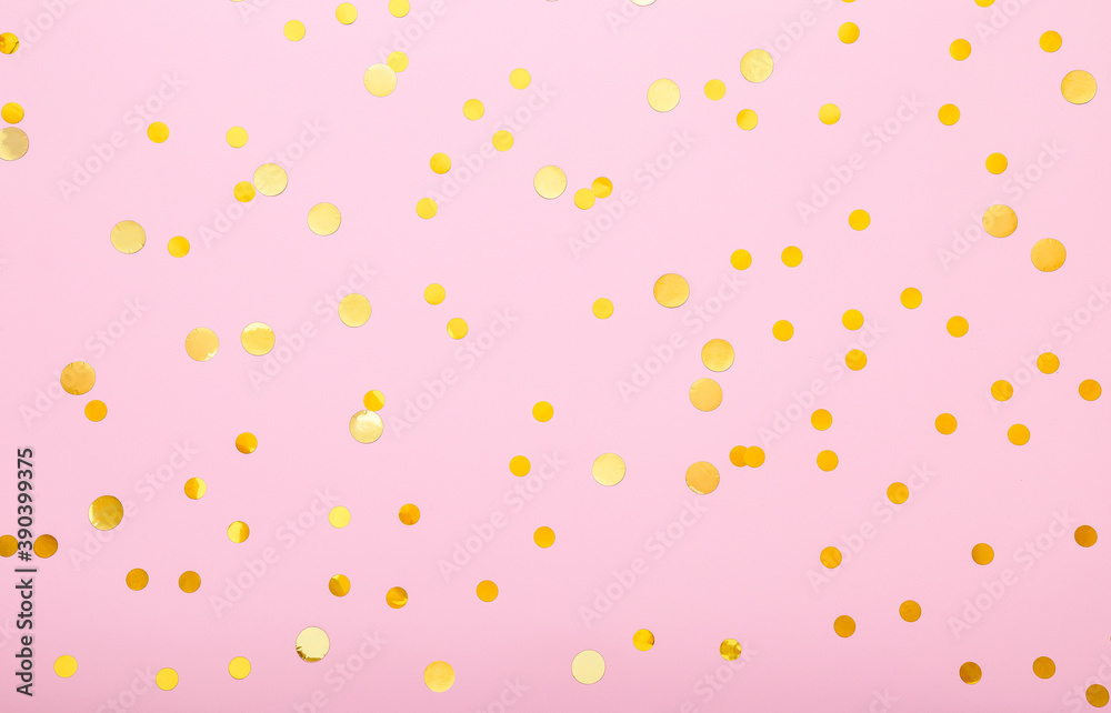Gold confetti sparkles on pink background. Flat lay, top view festive ...