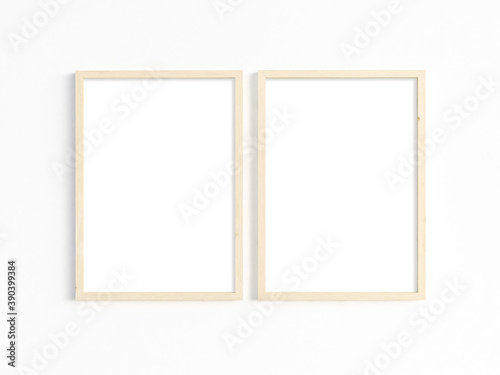 Two thin A4 wooden frames with portrait orientation. 3D illustration.