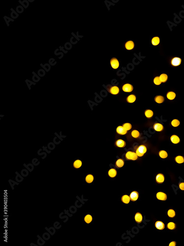 The golden side's or boke on a black background. Merry Christmas and happy New Year. Christmas background. © Viktoriya