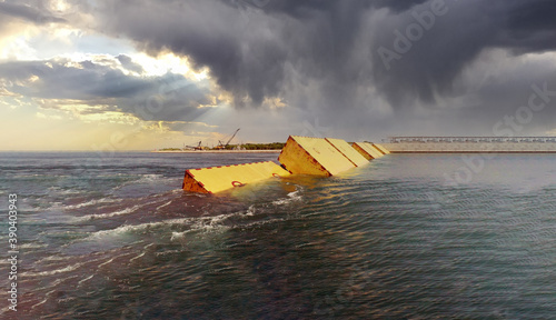 The MOSE System in Venice, Italy at the sunset for defense against high waters. Barrier against the high water in the defense of Venice Lagoon. New generation of industrial flood prevention system.