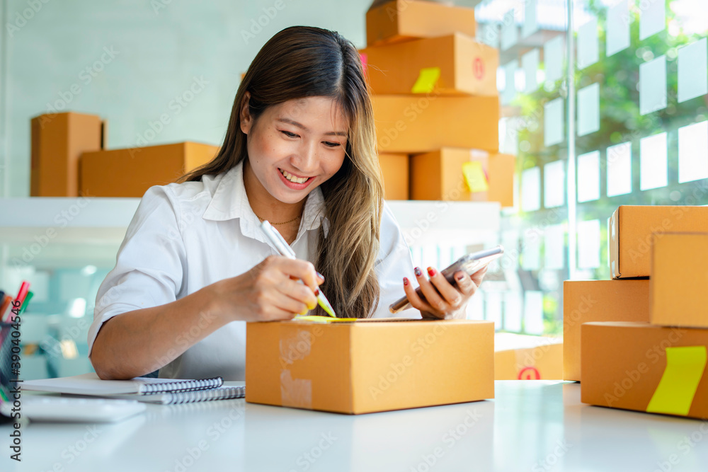 Starting small businesses SME owners female entrepreneurs Write the address on receipt box and check online orders to prepare to pack the boxes, sell to customers, sme business ideas online. Starting small businesses SME owners female entrepreneurs Write the address on receipt box and check online orders to prepare to pack the boxes, sell to customers, sme business ideas online.