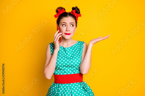 Photo of unsure girl smartphone call wear green red skirt isolated bright shine color background