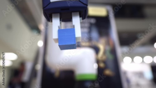 Wallpaper Mural The arm of the manipulator lifts the part from the table. Modern technologies in engineering. A robotic arm for industry. Artificial Intelligence Torontodigital.ca