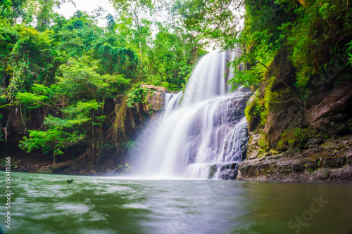 Fototapeta Naklejka Na Ścianę i Meble -  Waterfall with rocky in tropical rain forest on Koh Kood island