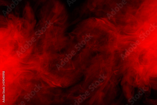 Red steam on a black background. © Nikolay