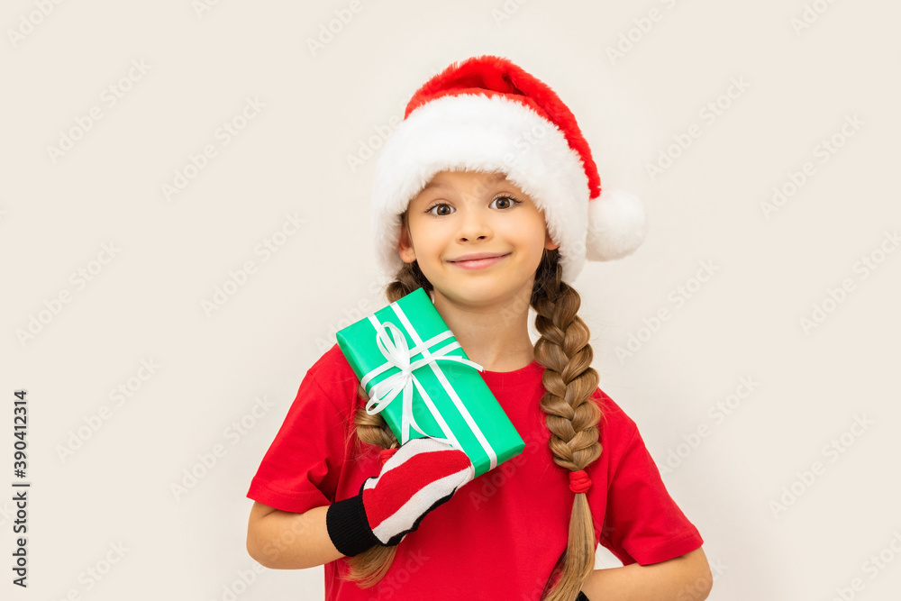 The girl is happy with a new year's gift. The girl is happy with a new year's gift.