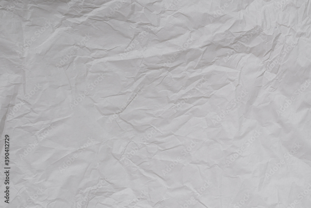 Obraz premium Crumpled white paper background.