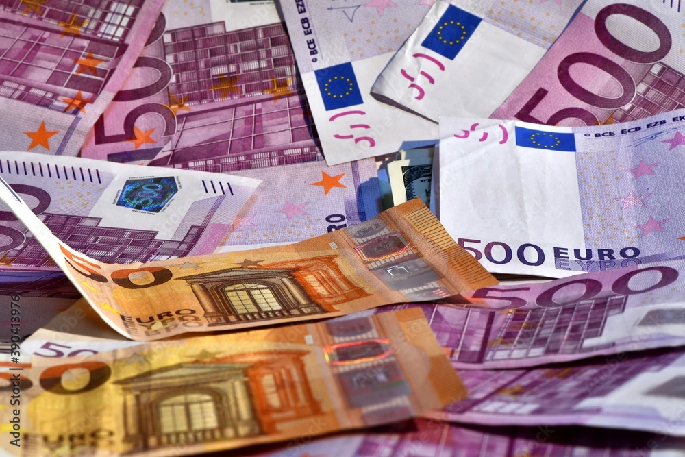 euro background. pile of 500 euro, 100 euro and 50 euro banknotes