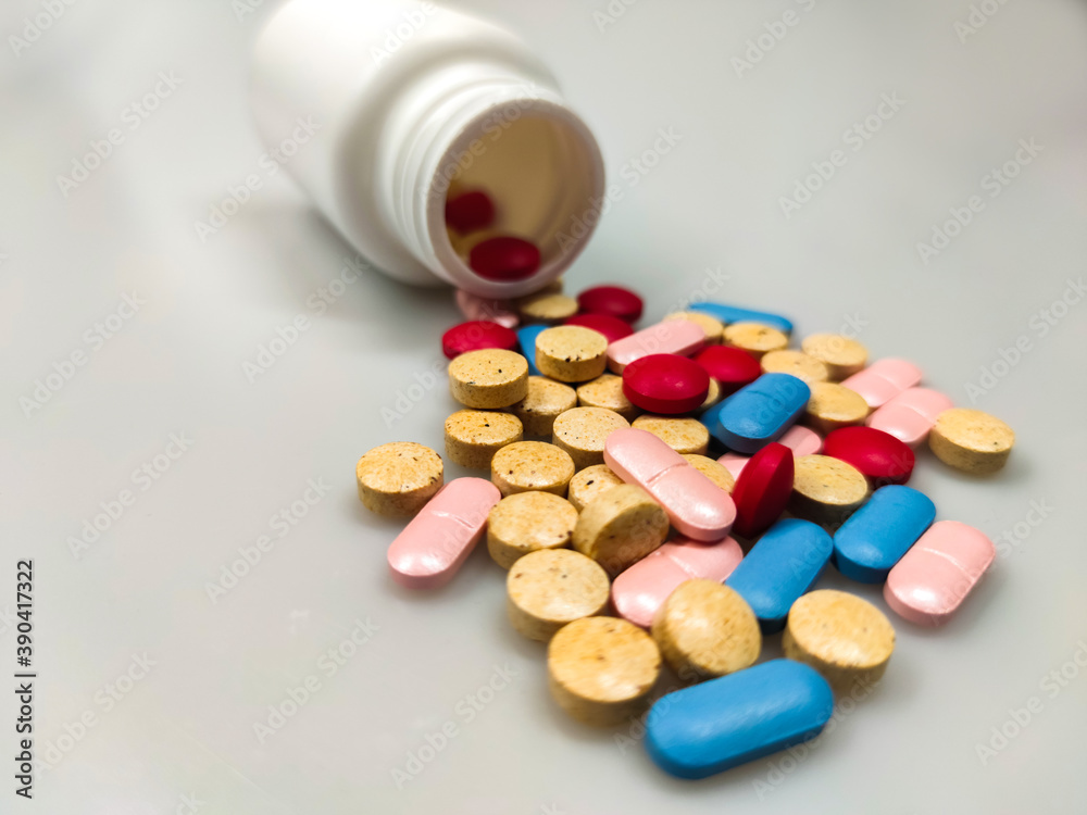 Colorful pills on the table Colorful pills on the table