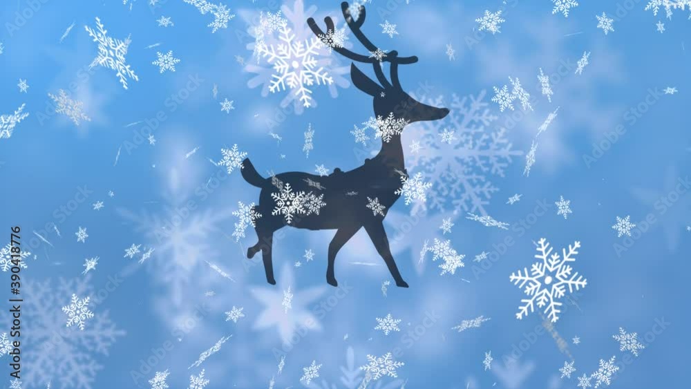 Digital animation of snowflakes falling over silhouette of reindeer walking against blue background Digital animation of snowflakes falling over silhouette of reindeer walking against blue background