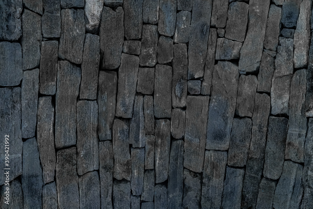 Medieval stone wall and arch architecture made from rough granite rocks. Close up. Medieval stone wall and arch architecture made from rough granite rocks. Close up.