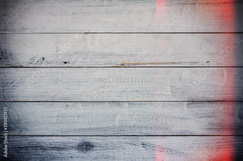 Vintage white wood background texture with knots and nail holes. Old painted wood wall. White abstract background. Vintage wooden dark horizontal boards