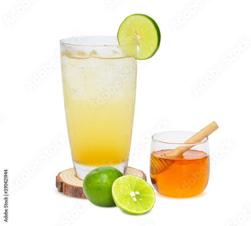 Lemon juice with honey Healthy drinking water on wood isolated on the white background. clipping path.