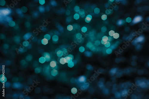 Christmas blue bokeh, lights in winter night, Abstract new year background
