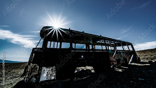 An old wreck of a bus on a field in Armenian countryside. Transport infrastructure is in disrepair and often still from Soviet era. Provides interesting photo opportunities nevertheless. © Janos