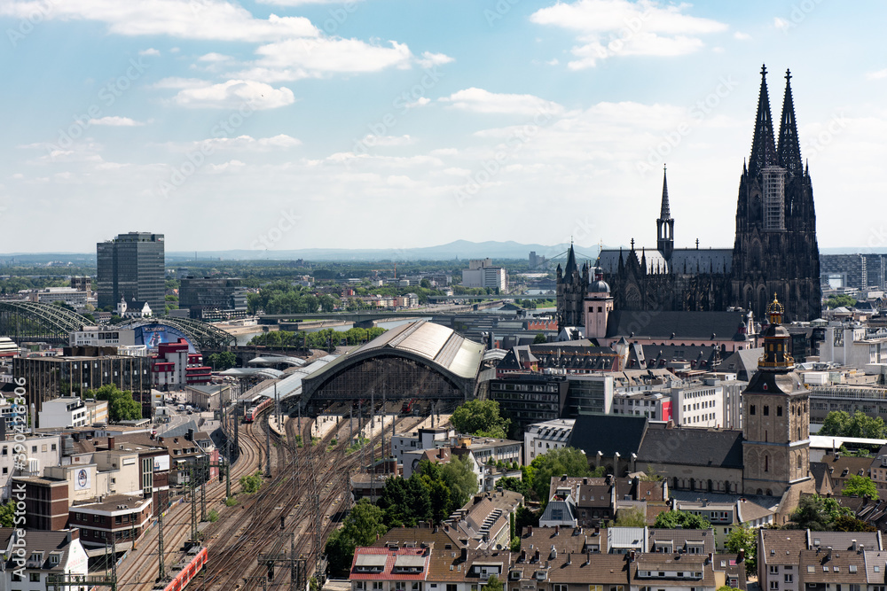 Panorama of Cologne City with Cathedral and railway station.