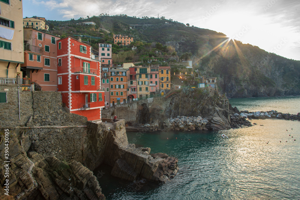 Amazing Riomaggiore town on Liguria coast in Italy -  fanatstic small colorful building on rocky hill