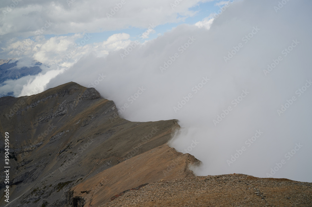 Cloud formation off the top of Mount Burke, Rocky Mountains, Kananaskis, Alberta, Canada