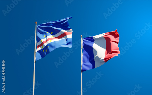 Beautiful national state flags of Cape Verde and France together at the sky background. 3D artwork concept.