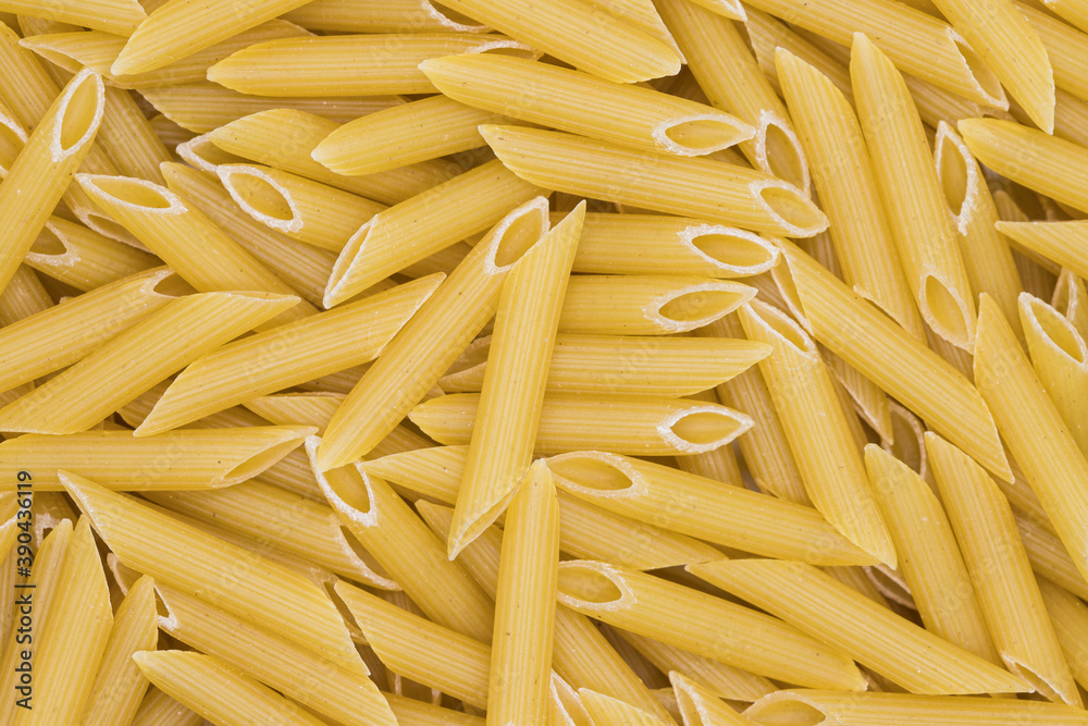 Penne pasta background. Healthy food textures and details for a restaurant Penne pasta background. Healthy food textures and details for a restaurant