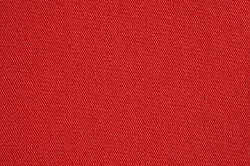 Red fabric texture background close up