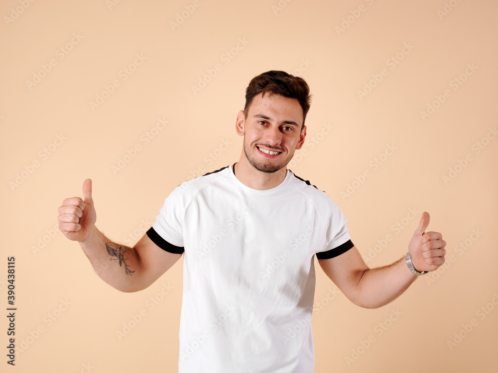 Young man with positive attitude and smiling Young man with positive attitude and smiling