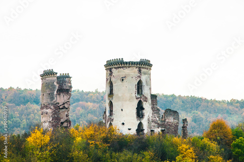 medieval castle in the forest. ancient ruined tower. dilapidated fortress. ruins of a knightly fortification. remains of the citadel