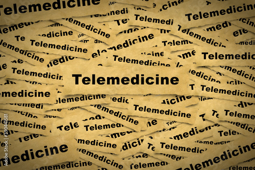 Abstract background from pieces of paper with the inscription telemedicine and related words in a vignette