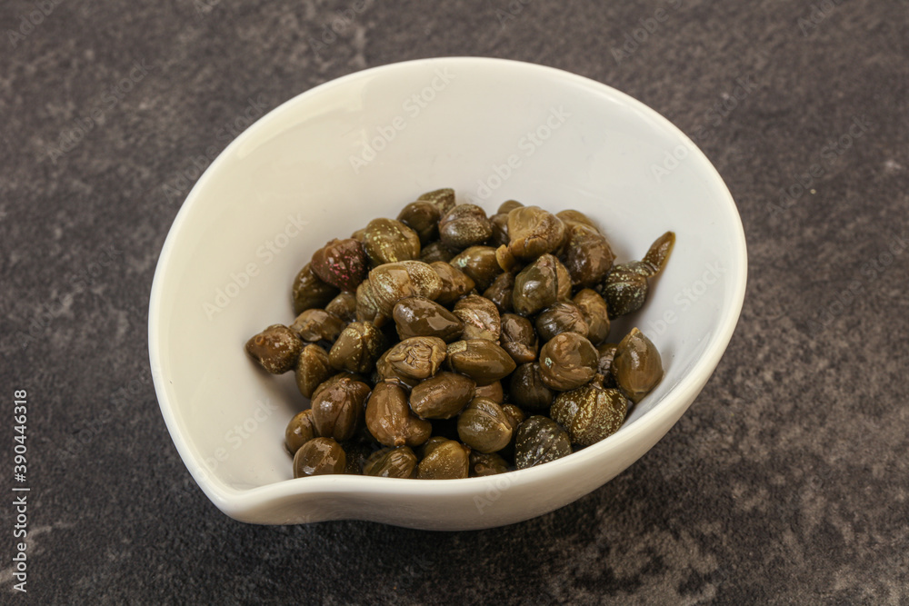 Tasty capers in the bowl Tasty capers in the bowl