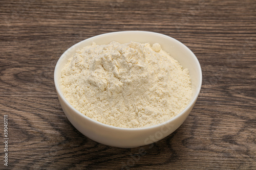 Wheat flour heap in the bowl