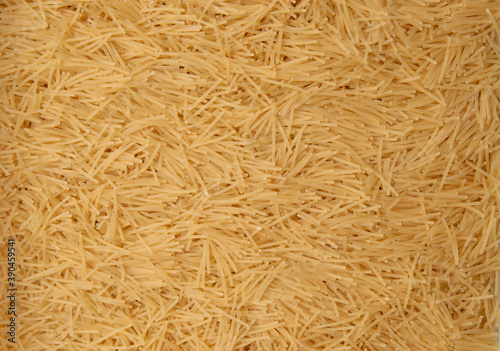 Raw vermicelli pasta background texture
