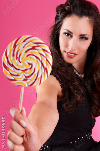 Frau hält Lolli photo