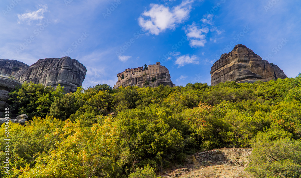 Amazing panoramic sunset view of the Holy Monastery of Varlaam in Meteora, Thessaly, Greece built on top of unique rock formations