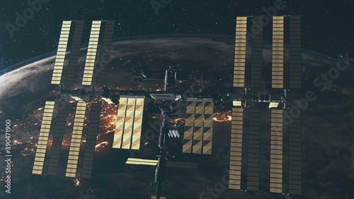 Gravity fly of International Space Station with huge solar panels at rotating Earth planet background. Spatial technology with illminated elements at 3d animation illustration. Science concept by NASA