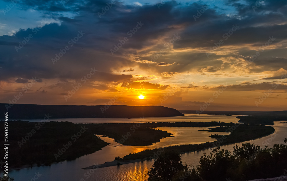 Fototapeta premium Landscape with sunset on the river in summer