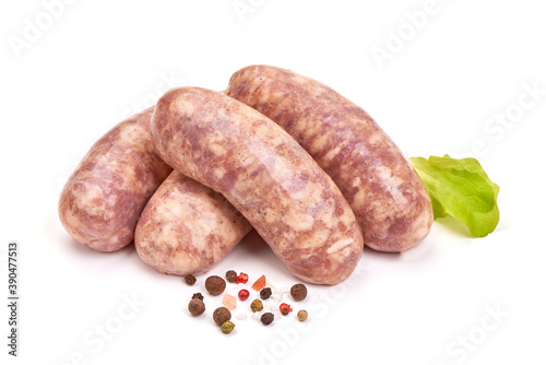 Raw pork Sausages, isolated on white background photo