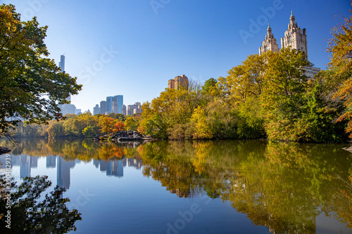 Trees and buildings reflect off the Lake in Central Park © GORDON