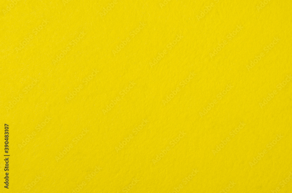 Texture of yellow fleecy rag cloth for wiping surfaces. Texture of yellow fleecy rag cloth for wiping surfaces.