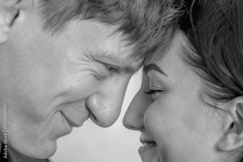 Close up of young loving sensual couple touching forehead, enjoying intimacy tenderness in love. Relationship, love, feeling concept. Close up of young loving sensual couple touching forehead, enjoying intimacy tenderness in love. Relationship, love, feeling concept.