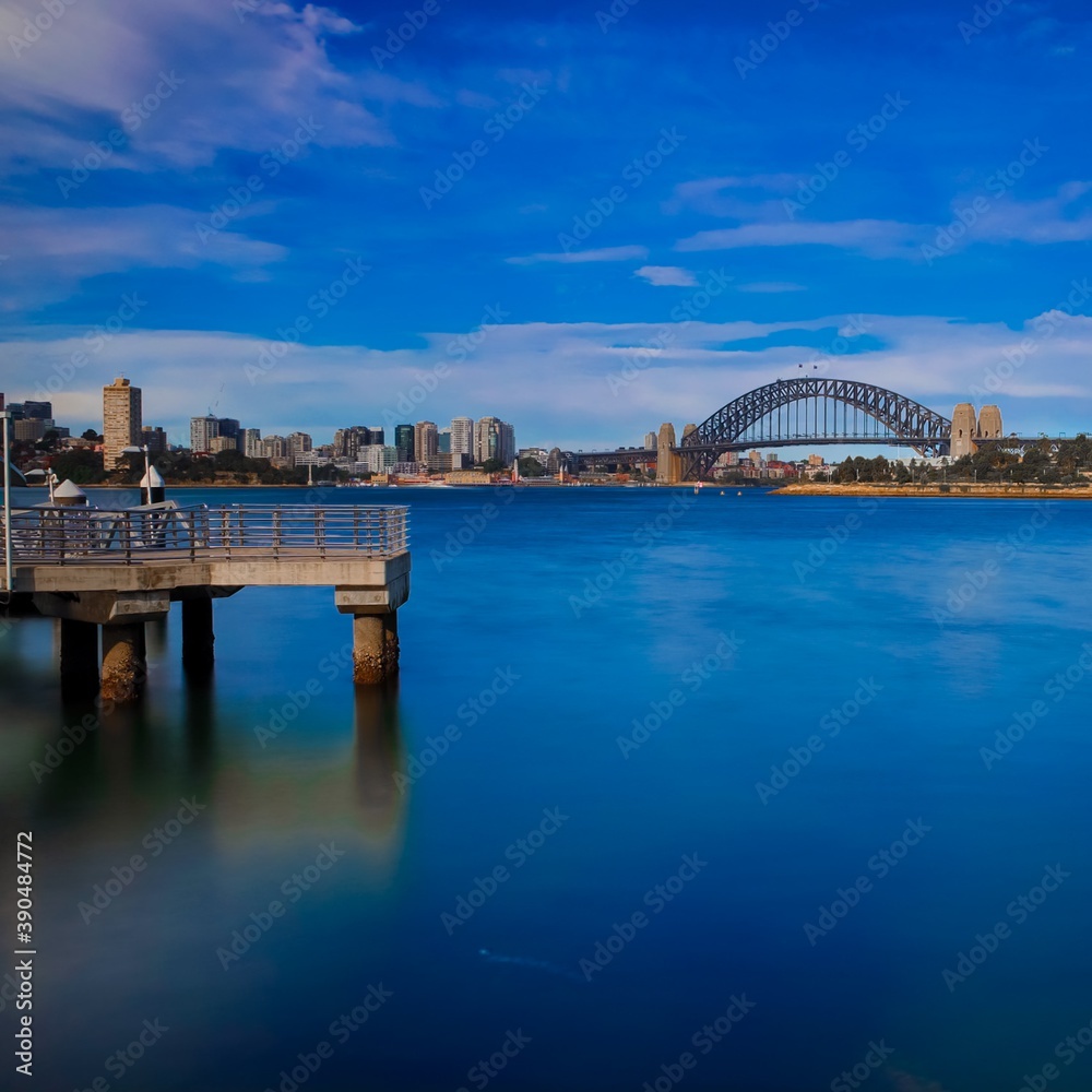 Fototapeta premium Camera Shutter Long Exposure view of Sydney Harbour Bridge viewed from Balmain wharf