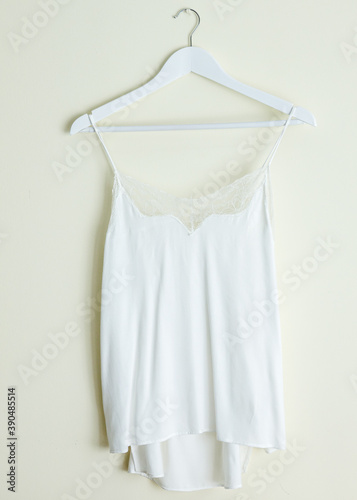 White Silk and Romantic Nightwear on Hanger Monochrome Color Minimal Design