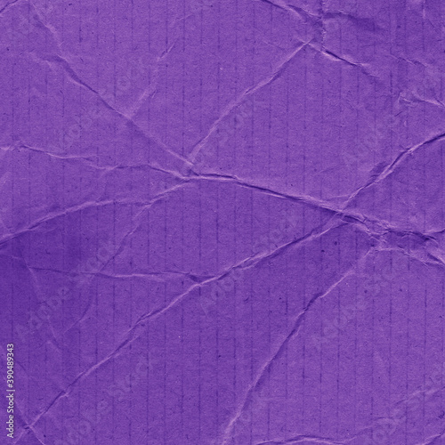 A violet vintage rough sheet of carton. Recycled environmentally friendly cardboard paper texture. Simple minimalist papercraft background. © artistmef