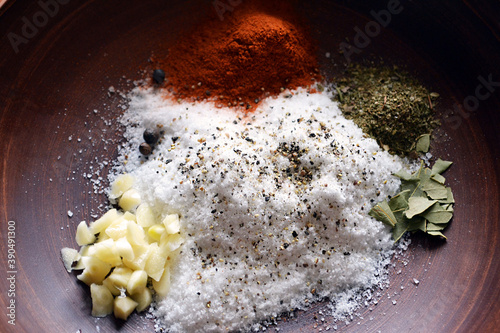 Salt with chopped garlic and spices top view