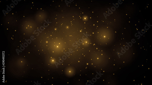 Luxury gold particles on black background	
 photo