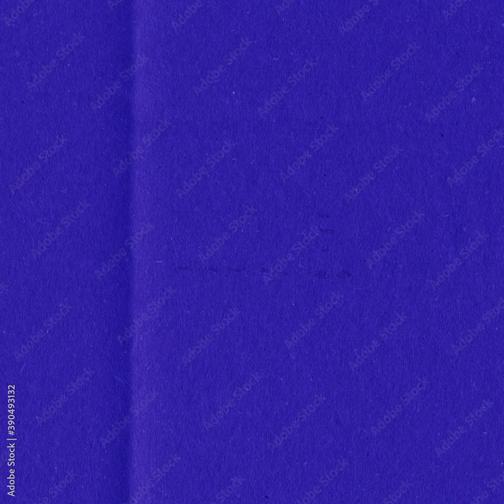 Fototapeta premium A violet vintage rough sheet of carton. Recycled environmentally friendly cardboard paper texture. Simple minimalist papercraft background.