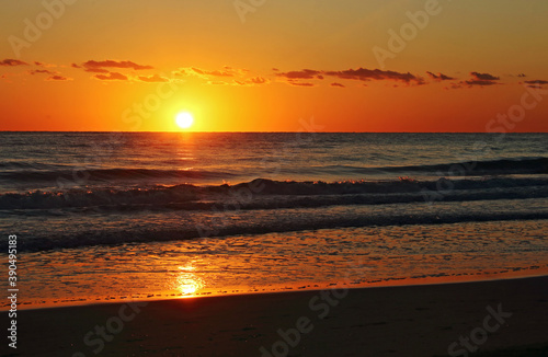 A golden sunrise on the beach, Mediterranean sea