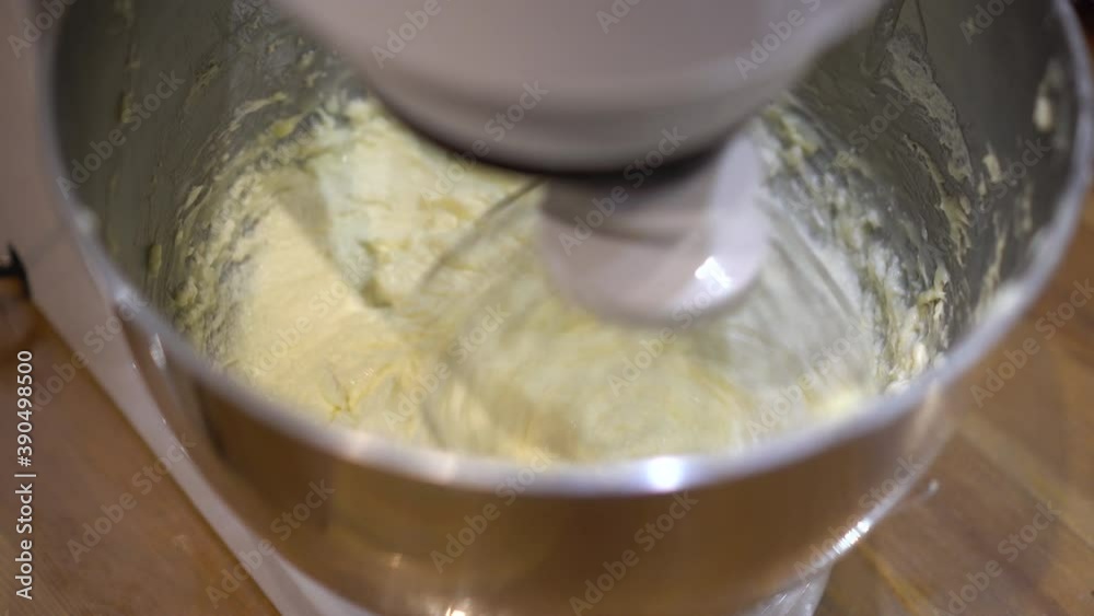 The planetary mixer beats the cream for the culinary products. Kitchen automatic mixer. The planetary mixer beats the cream for the culinary products. Kitchen automatic mixer.