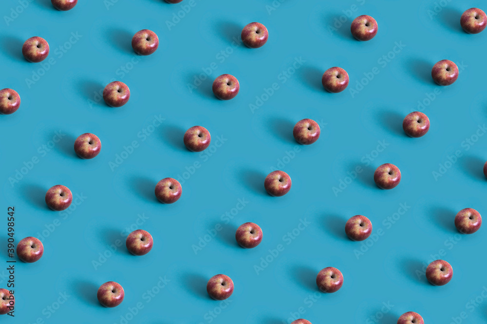 Fresh apples pattern on a blue background Fresh apples pattern on a blue background